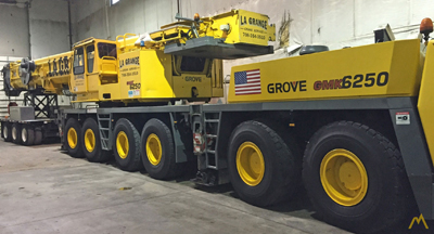 Export Logistics & Shipping, Inc. stores Grove GMK6250 crane in warehouse during drayage
